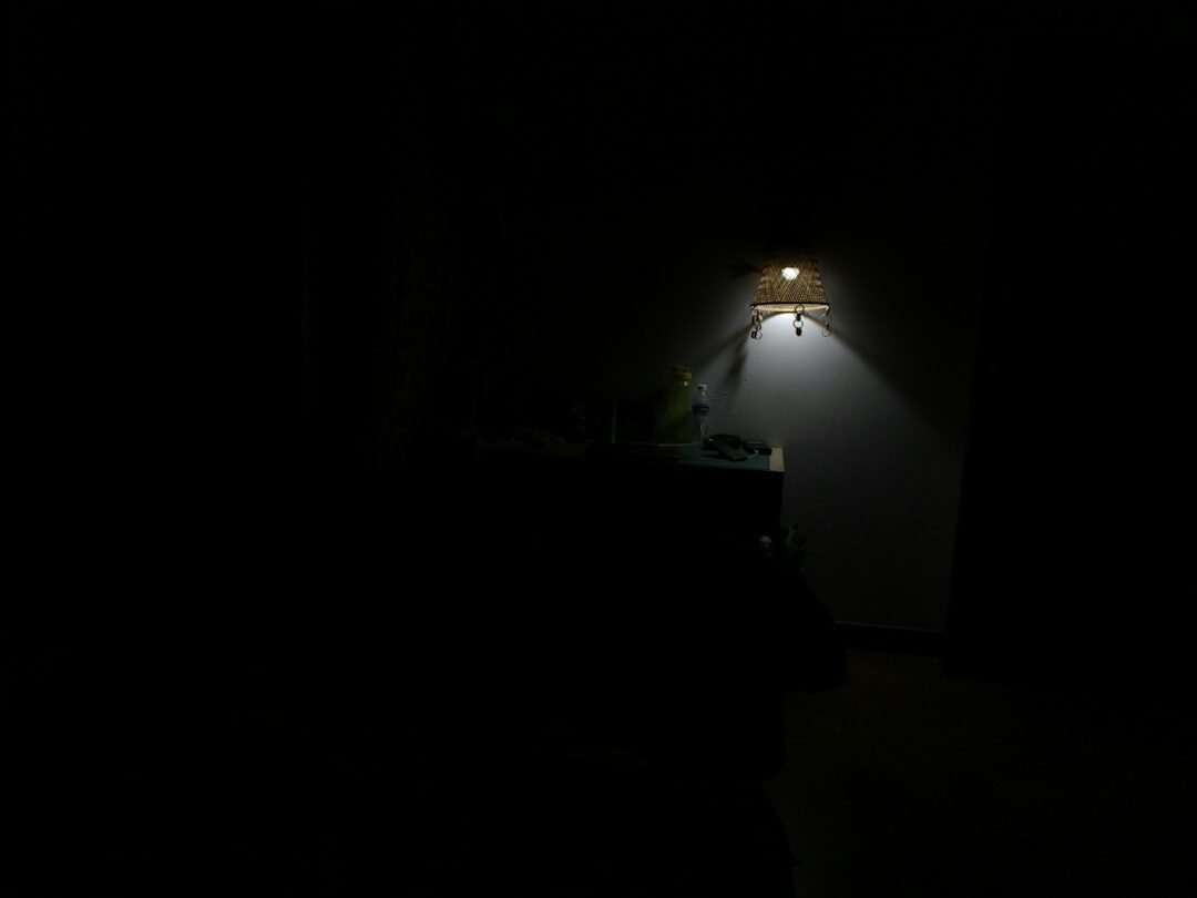 mysterious character in dark room