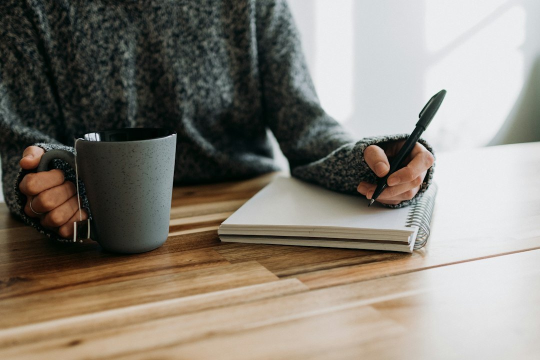 writer revising manuscript