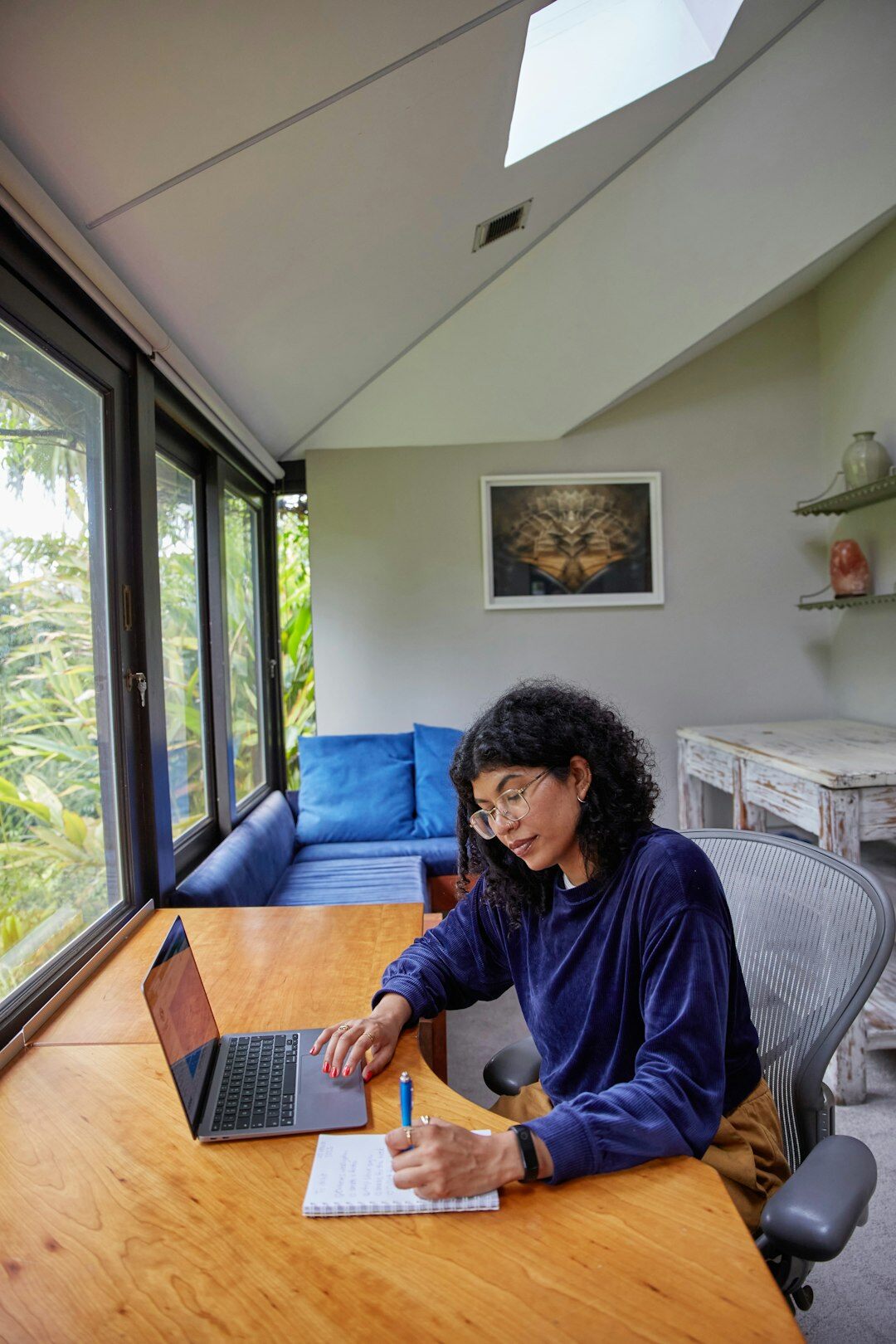 writer at desk with notebook