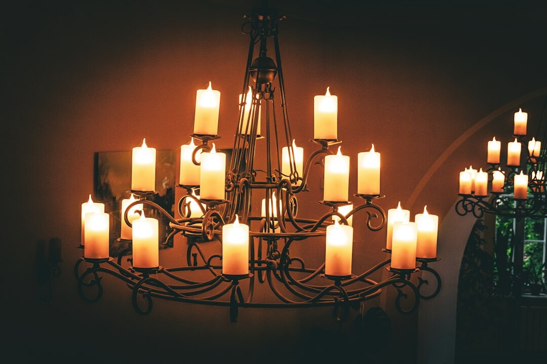 flickering candle in dark room